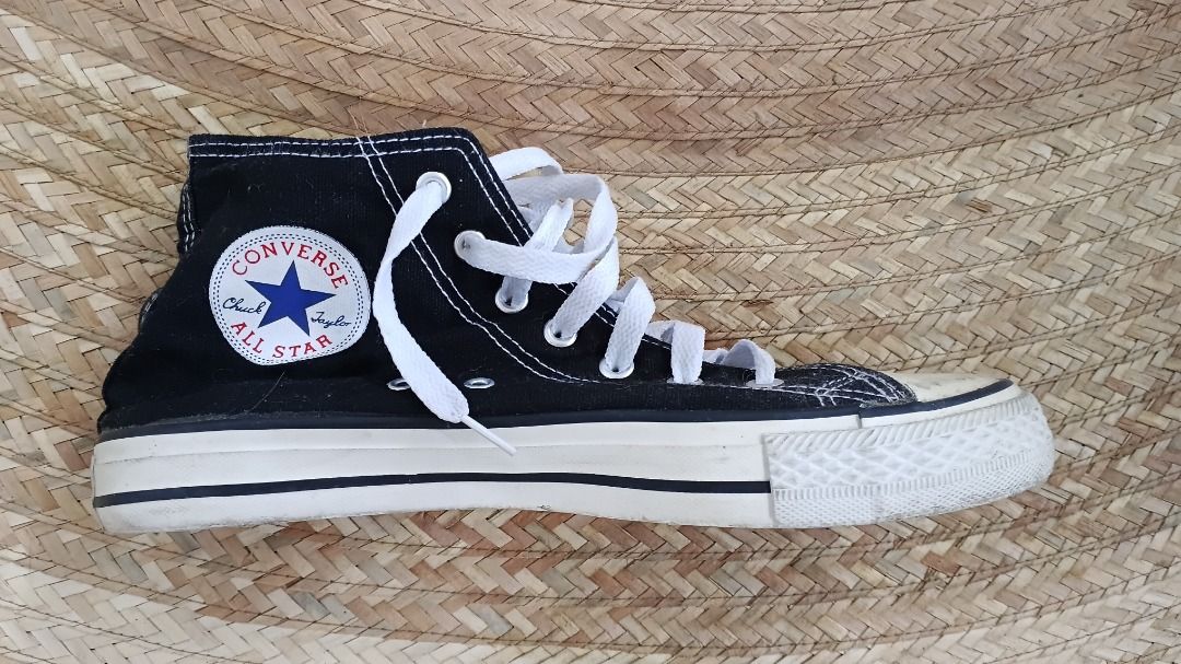 Converse Chuck Taylor All-Star Popeye High Tops (Category: Sneakers) located in Caloocan City. Submitted by maruja36 (Listing ID 1461189372, Image 3). Description: - Iconic Converse high tops featuring a fun Popeye graphic print. - Classic black canvas upper with crisp white laces and soles. - Size: US Men's 7.5 / US Women's 9.5. - A must-have for any Popeye enthusiast or collector!.