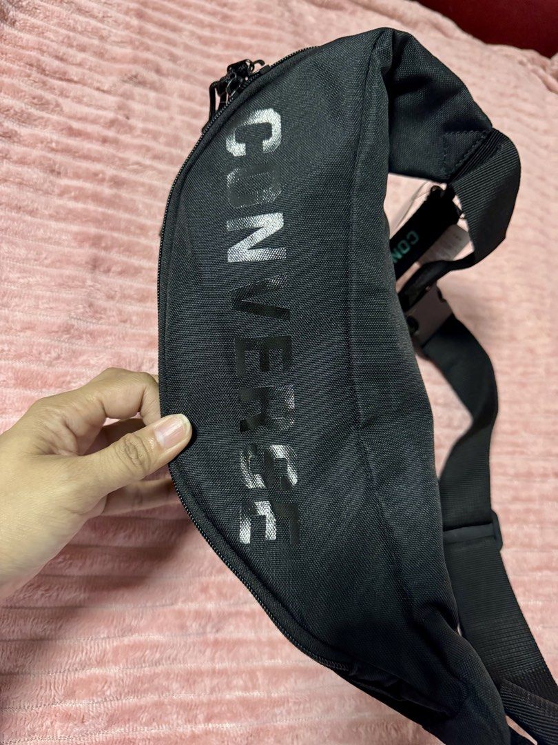 CONVERSE CROSSBODY / SLING BAG (Category: Belt bags, Clutches and Pouches) located in Taguig. Submitted by shopbyluna18 (Listing ID 1461317304, Image 3). Description: Brand New with Tags ✨ Original Converse ✨ Classic all-black design ✨ Spacious main compartment ✨ 2 zippered compartments for better organization ✨ Adjustable strap with secure buckle ✨ Lightweight and easy to carry ✨ Perfect for everyday errands, travel, casual OOTD & on-the-go esse