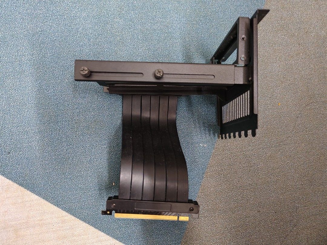 Cooler Master PCIe Riser Cable Bracket (Category: Computer Parts) located in Kuala Lumpur. Submitted by nul_haqim (Listing ID 1461151272, Image 1). Description: - Cooler Master Vertical GPU Mount - Includes riser cable and bracket - Allows vertical graphics card installation - Black finish - Minor scuffs on bracket from installation - Tested and working - Nego till let go .