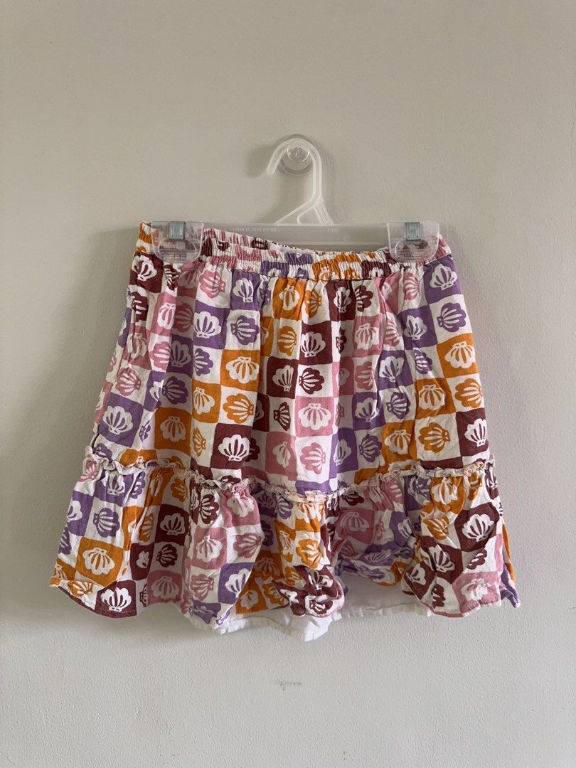 Cotton On Kids Shell Print Skirt (Category: Babies & Kids Fashion) located in Paranaque City. Submitted by prebyb (Listing ID 1461167738, Image 1). Description: Cute Cotton On Kids tiered skirt with a fun pastel shell print and comfy elastic waistband..