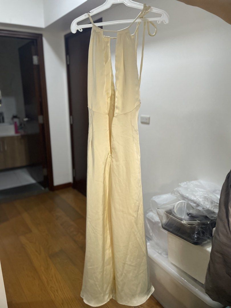 Cream Halter Neck Ruched Maxi Dress (Category: Dresses) located in Manila. Submitted by ellie_owl (Listing ID 1461225679, Image 3). Description: Bought this for ₱1,699 and only used it once for about 4 hours. Perfect for attending weddings, events, or birthdays! Selling it now for only ₱1,450. You can also rent it for only ₱450, with a ₱1,000 deposit for assurance. Message me if interested!.