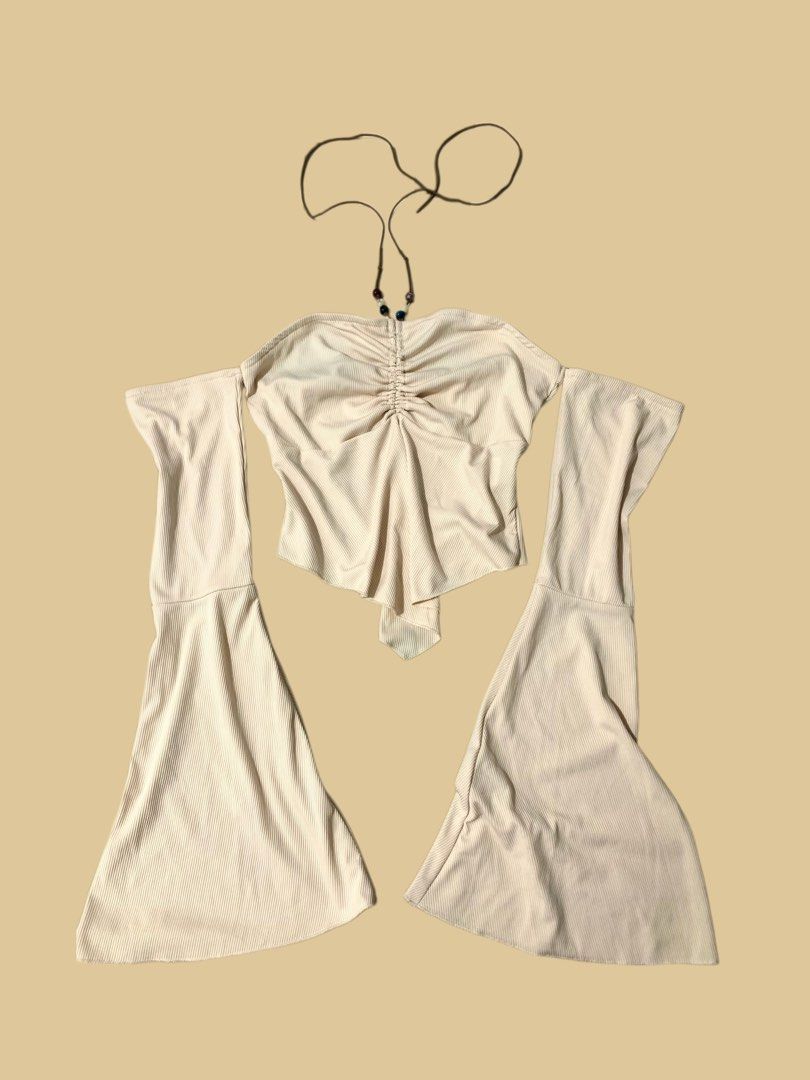Cream-colored ribbed halter top (Category: Others Tops) located in Naga. Submitted by cydie.finds (Listing ID 1461312008, Image 1). Description: •naga city,camsur -jnt/meetup •gcash.
