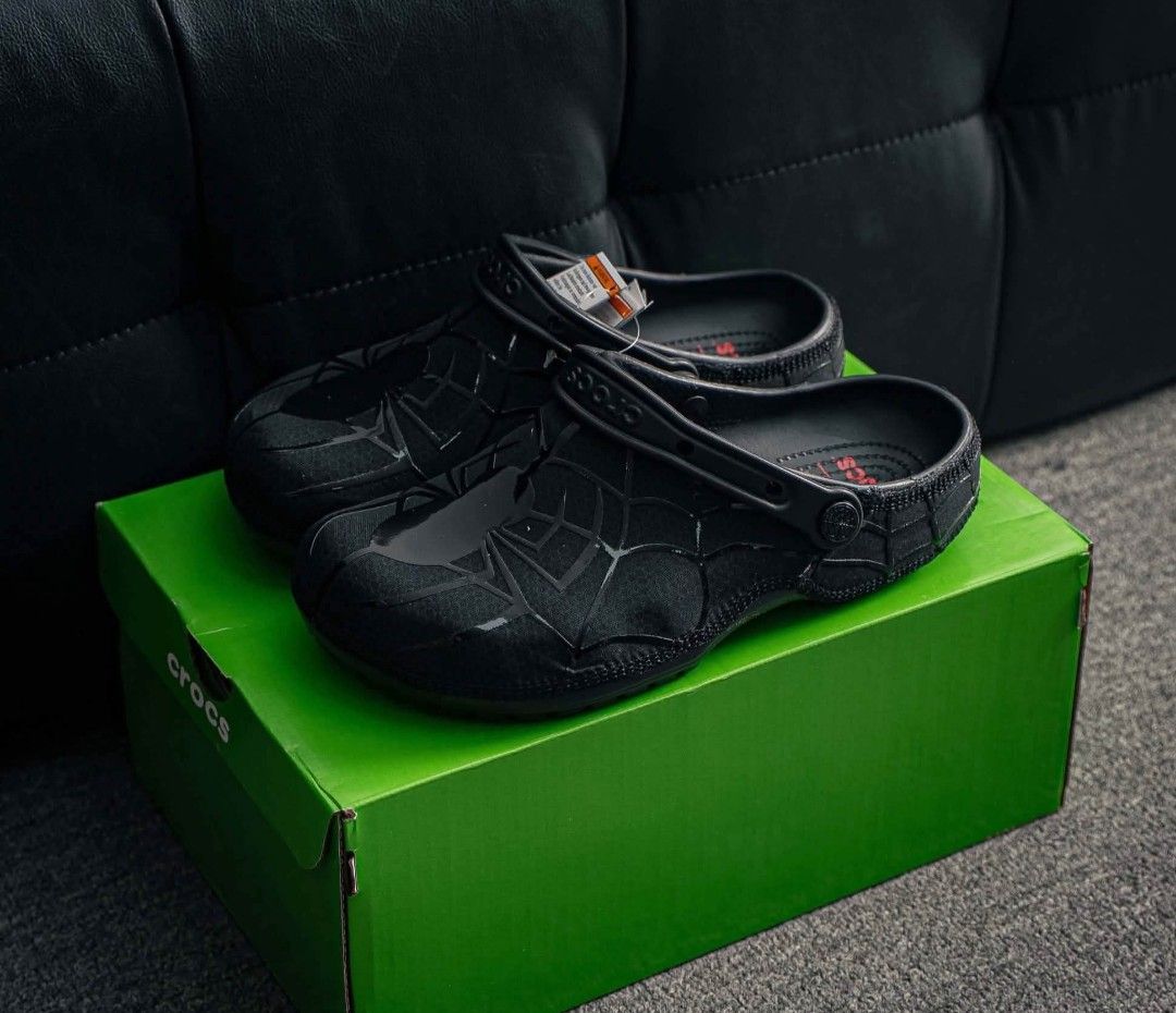 Crocs Spider-Man Clogs - Red & Black (Category: Slippers & Slides) located in Baguio. Submitted by authenticity1of1 (Listing ID 1461260785, Image 2). Description: - Spider-Man themed Crocs - Available in Red with black web design or All Black with web design - Classic Crocs comfort and style - Ideal for any Marvel fan - Comes with original box.
