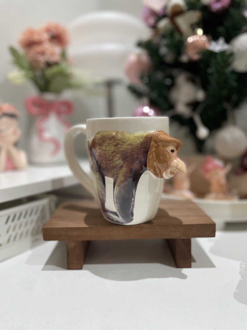 Cute Monkey Face Ceramic Mug (Category: Coffee & Tea Tableware) located in Quezon City. Submitted by mugs.meowph (Listing ID 1461289425, Image 1). Description: - Unique monkey face and body design wraps around the mug. - Adds a fun and quirky touch to your kitchenware. - Perfect for your morning coffee or tea. - Dishwasher safe for easy cleaning. - Approximately 4 inches tall..