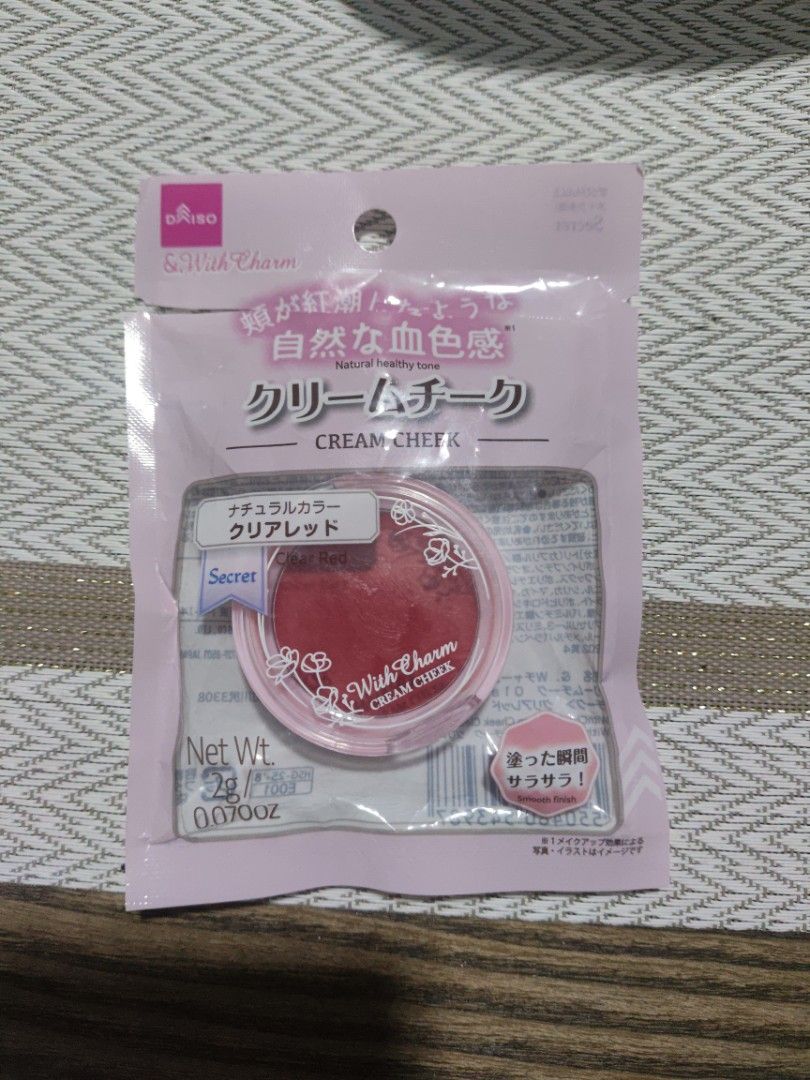 DAISO Cream Cheek Blush (Category: Makeup) located in Manila. Submitted by prelovedby_joie (Listing ID 1461218949, Image 1). Description: - Cute pot packaging - Lovely rosy red shade - Smooth and blendable texture - Creates a natural flush - Easy to apply with fingers or brush - Small and portable for on-the-go touch-ups.