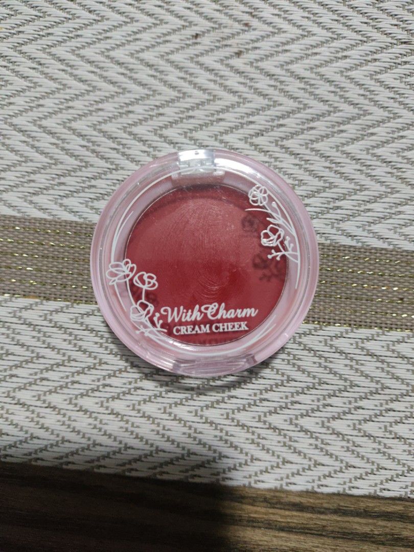 DAISO Cream Cheek Blush (Category: Makeup) located in Manila. Submitted by prelovedby_joie (Listing ID 1461218949, Image 2). Description: - Cute pot packaging - Lovely rosy red shade - Smooth and blendable texture - Creates a natural flush - Easy to apply with fingers or brush - Small and portable for on-the-go touch-ups.