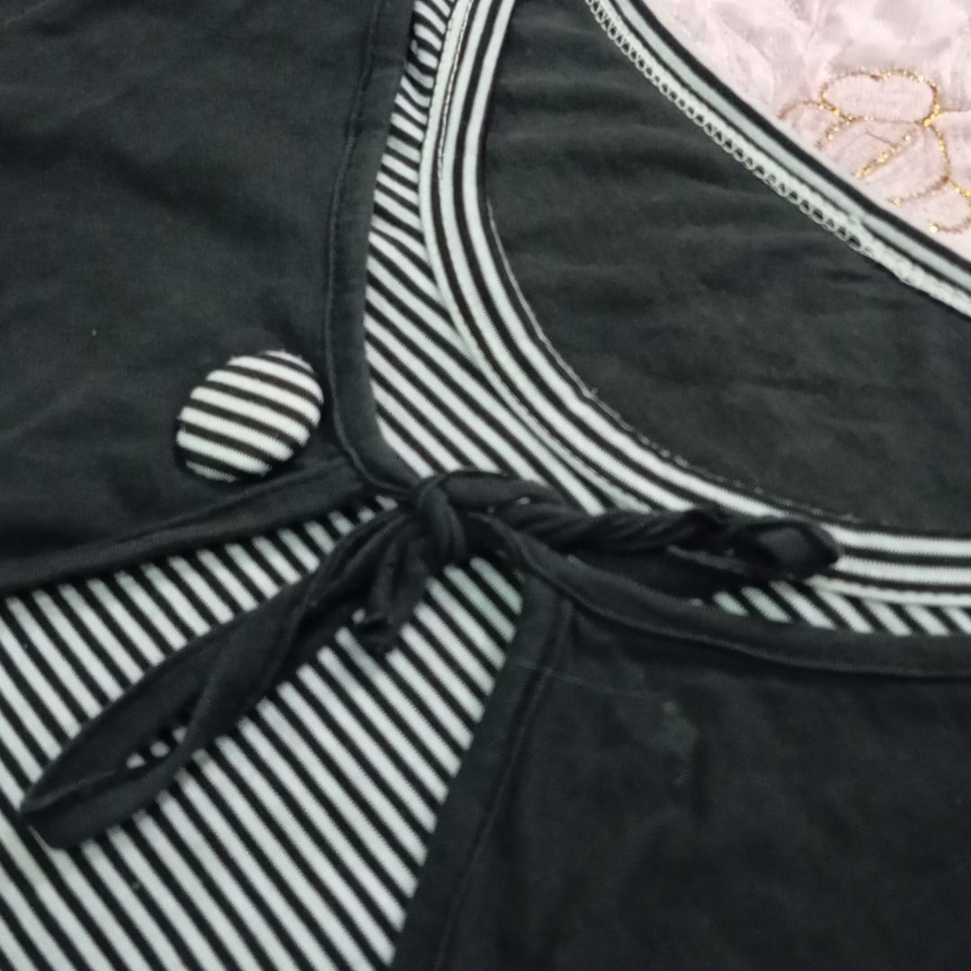 Black & White Striped Top with Bolero (Category: Blouses) located in Balanga. Submitted by elle.armoire (Listing ID 1461165757, Image 2). Description: - Cute dark grey top with white stripes - Features a tie front - Button detail on the side - Striped trim on neckline and hem - Comfortable layering piece - Great for casual wear.