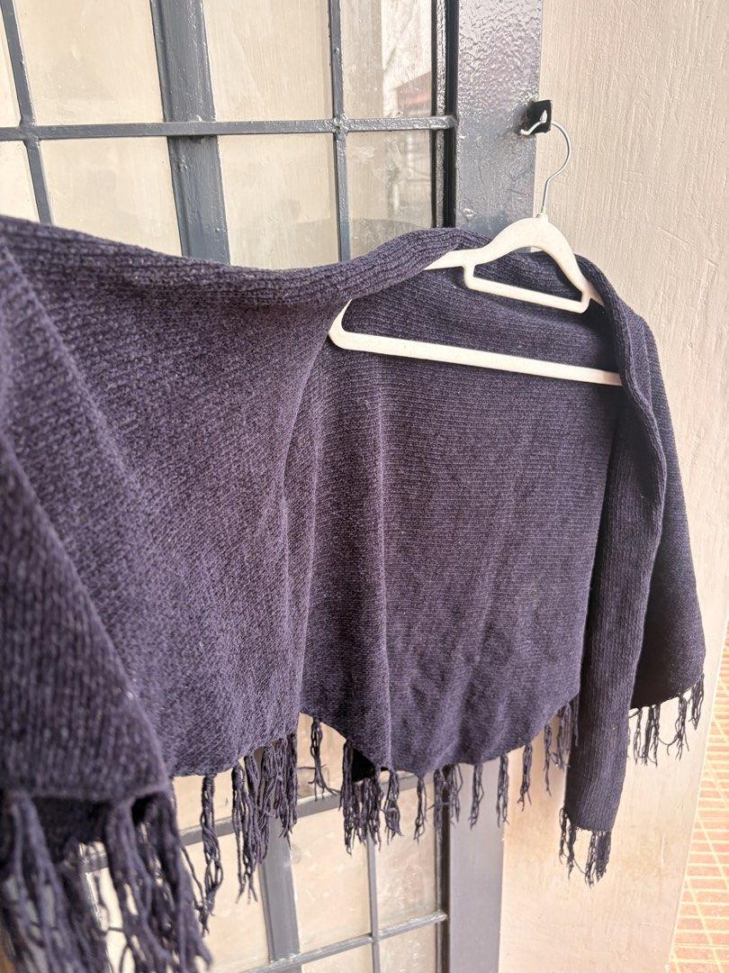 Dark Navy Knit Poncho with Fringe (Category: Coats, Jackets and Outerwear) located in Cainta. Submitted by declutteringprelovedbyzelle (Listing ID 1461247156, Image 2). Description: - Cozy dark navy knit poncho - Features stylish fringe detail along the hem - Easy to wear over any outfit - Provides extra warmth and style - Ideal for layering in cooler weather - A versatile addition to your wardrobe.