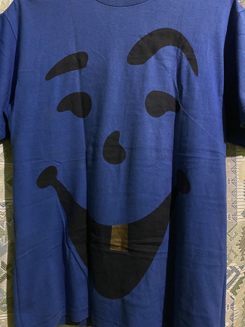 DGK x Kool-Aid (Category: Tshirts & Polo Shirts ) located in Manila. Submitted by all_about2 (Listing ID 1461235161, Image 2). Description: DGK x Kool-Aid collaboration t-shirt featuring a large graphic of the Kool-Aid Man’s face with a distinctive gold tooth detail..