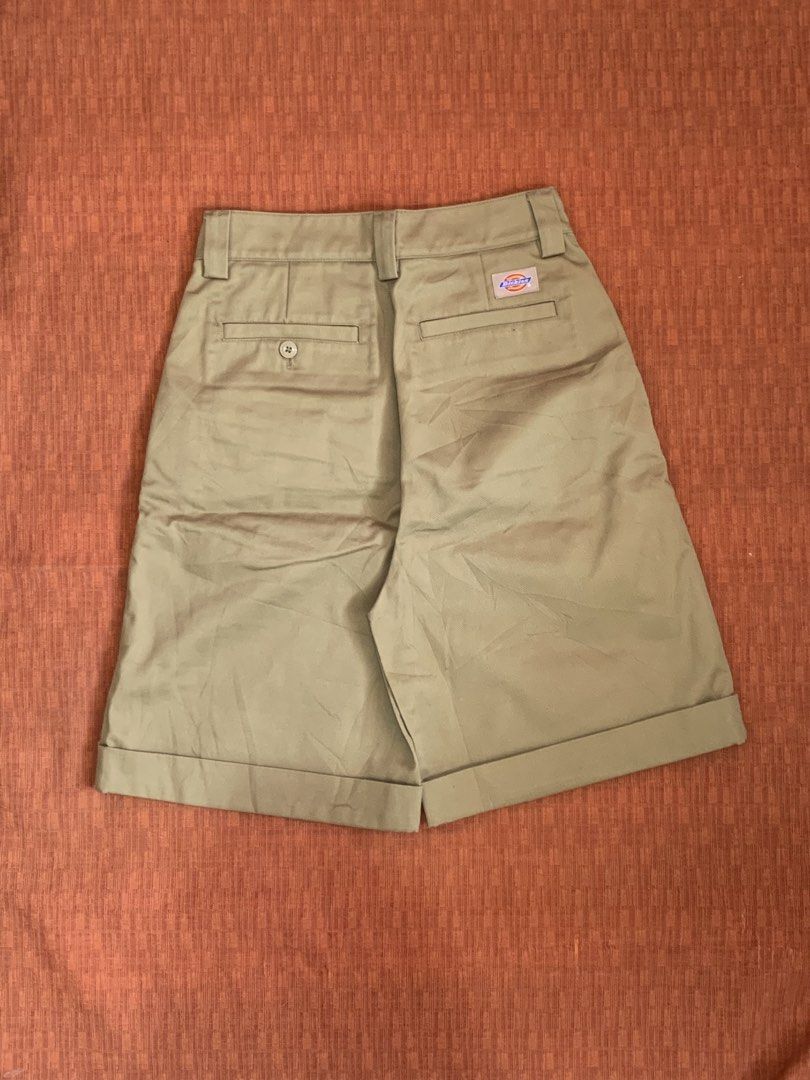 Dickies Khaki Pleated Shorts Size 26 (Category: Shorts) located in Davao. Submitted by flipted_generics (Listing ID 1461240773, Image 2). Description: - Khaki Dickies shorts - Size 26 - Pleated front design - Cuffed hem - Waistband with Dickies logo pattern - Material: 65% polyester, 35% cotton - Ideal for casual wear.