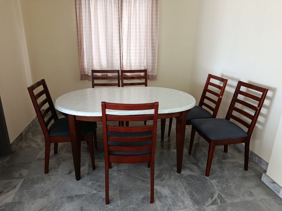 Dining table (Category: Tables & Sets) located in Kuala Lumpur. Submitted by wendyeng_28 (Listing ID 1461130818, Image 1). Description: The dining table is still in good condition, but it gets a bit shaky when you move it. Self pick up only.