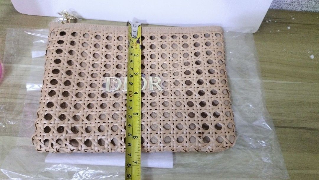 DIOR GWP pouch with box (Category: Luxury Bags & Wallets) located in Manila. Submitted by arianne0828 (Listing ID 1419397430, Image 3). Description: brand new pouch perfect for makeup pouch or as a purse. Dimension: 22cm x 17cm fit IPhone pro Max pickup Binondo.