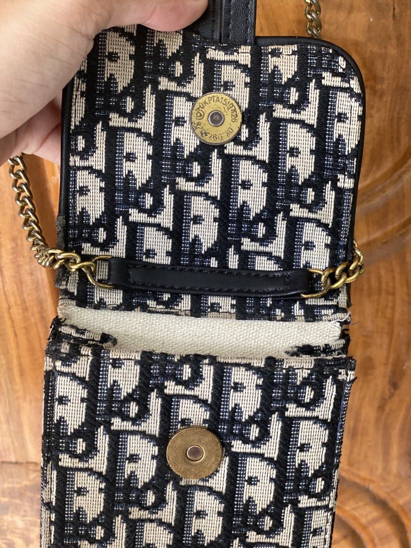 Dior Oblique Canvas Phone Pouch Bag (Category: Luxury Bags & Wallets) located in Tubigon. Submitted by theogarments (Listing ID 1461262303, Image 3). Description: Christian Dior -excellent -off only -need wash -kasya wallet pati cellphone -keep it if not sold 500.