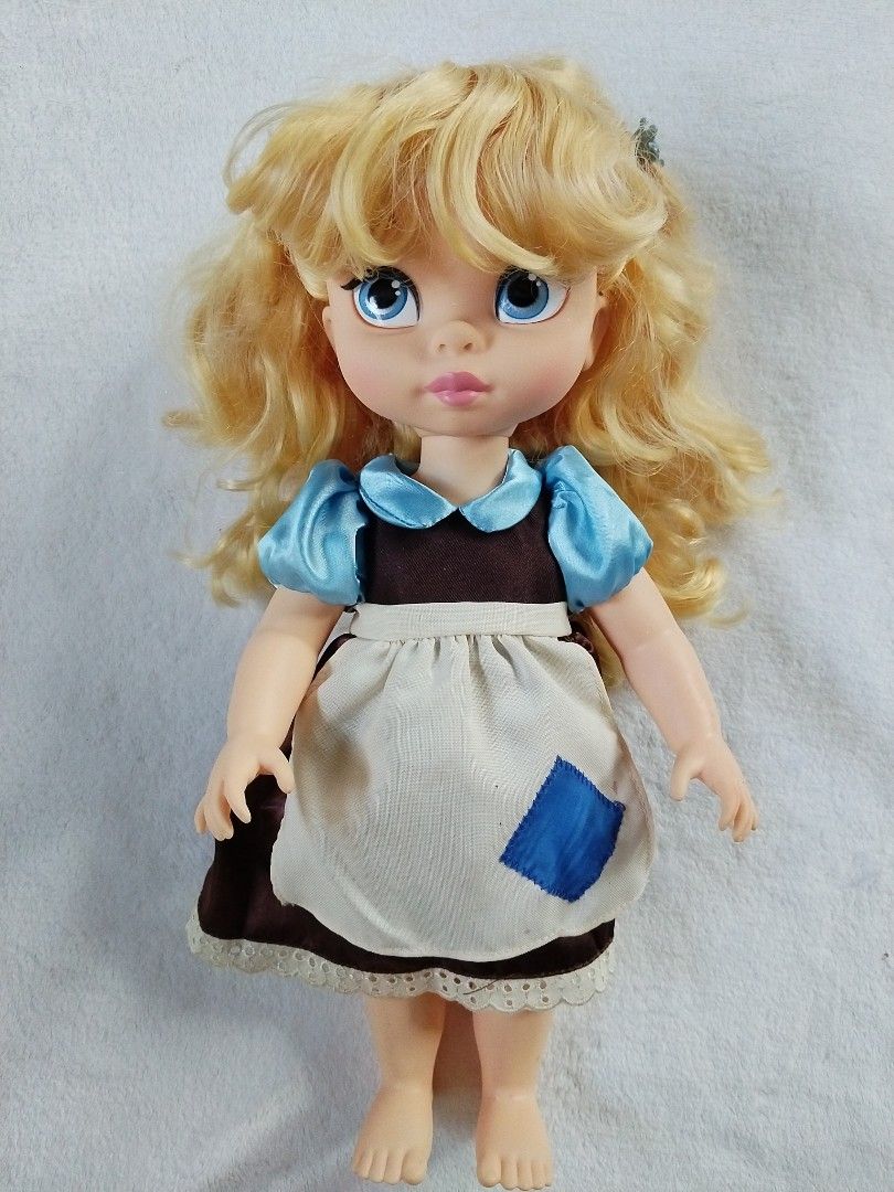 Disney animator Cinderella (Category: Figurines & Statues) located in Goa. Submitted by liz1104 (Listing ID 1461120450, Image 1). Description: Authentic Disney produced animator doll Wearing her original peasant dress. no bitemarks Her flaw is color transfer from her brown skirt. Check pictures 6,7 & 8 Pen dots on leg. Can be removed by benzac Gcash First to pay.
