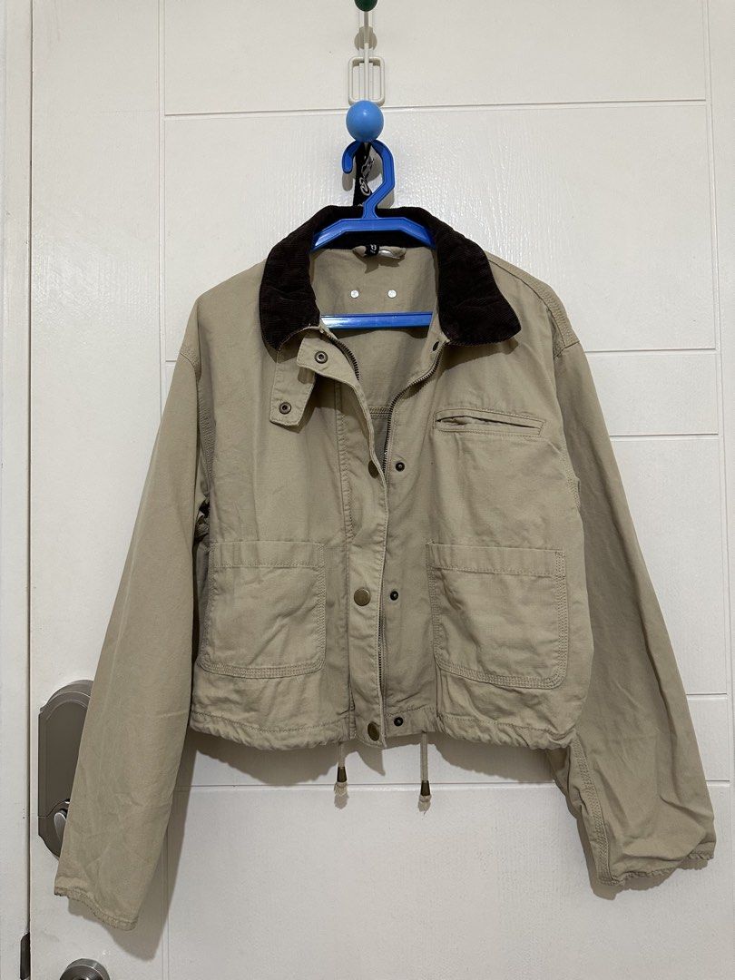 DIVIDED by H&M Beige Cropped Jacket Size S (Category: Coats, Jackets and Outerwear) located in Manila. Submitted by itsyourgirlmc (Listing ID 1461287571, Image 1). Description: - Beige cropped jacket from DIVIDED by H&M - Features a corduroy collar - Button-up front with zip closure - Two front pockets and one chest pocket - Drawstring hem for adjustable fit - Size S - Perfect for layering.