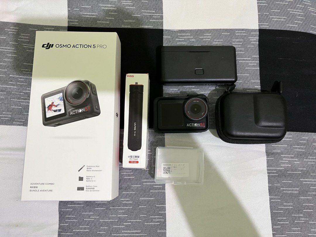DJI Osmo Action 5 Pro Adventure Combo with Accessories (Category: Cameras) located in Mangatarem. Submitted by vyullaaa (Listing ID 1461167370, Image 1). Description: - DJI Osmo Action 5 Pro Adventure Combo - RUSH SALE! - Bought: April 19,2026 - RFS: need funds - Used 4 times only - Includes: Camera, multiple batteries, charging case, extension rod, protective cases - Also comes with: Mini tripod and lanyard and extra screen protector - Ideal for