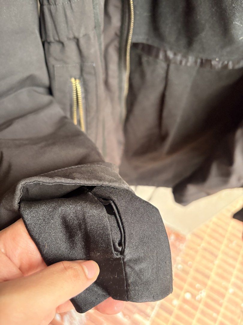 DKNY Black Hooded Jacket with Zip Pockets (Category: Coats, Jackets and Outerwear) located in Cainta. Submitted by declutteringprelovedbyzelle (Listing ID 1461243819, Image 2). Description: Zipper needs to be fixed.