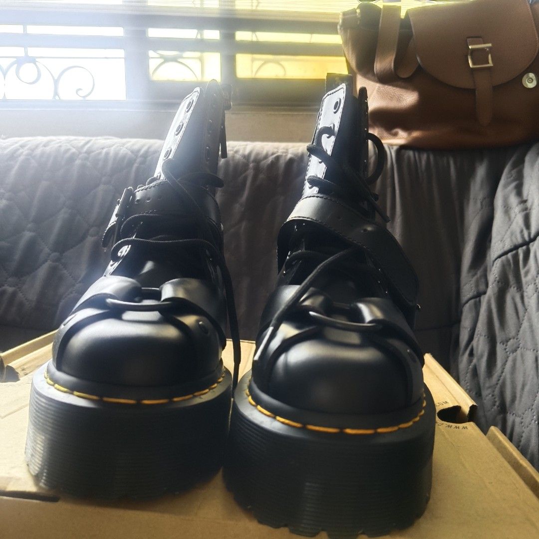 Dr. Martens Black Platform Buckle Boots (Category: Boots) located in Manila. Submitted by chonkiethecat (Listing ID 1461157474, Image 1). Description: - Black Dr. Martens platform boots - Multiple buckle straps and laces - Chunky platform sole with signature yellow stitching - Adds an edgy vibe to any outfit - Super comfortable and stylish RFS: wrong size Original price 6.5k slightly negotiable.
