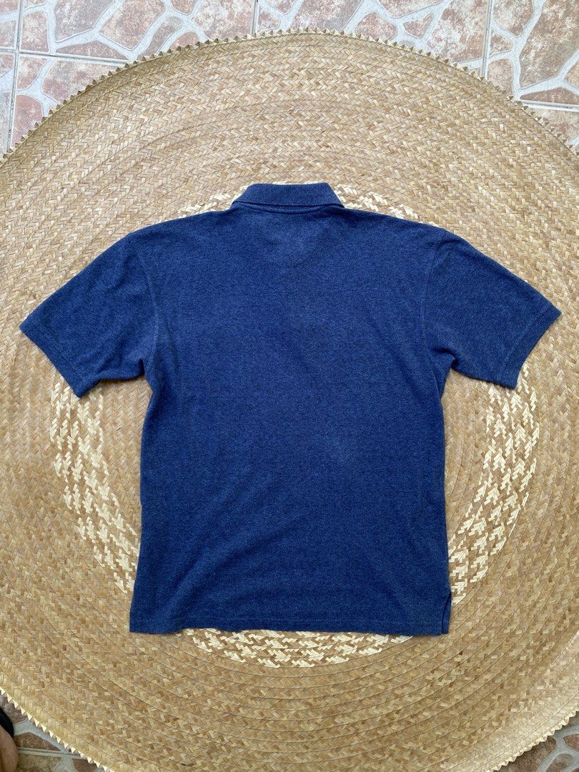 Dunhill Polo Shirt (Category: Tshirts & Polo Shirts ) located in Legazpi City. Submitted by inviteonly (Listing ID 1461219423, Image 2). Description: — 100% cotton — pique-knit polo with ribbed collar and sleeve ends —20 1/2” pit to pit on tape — 27 1/2” base of collar to hem on tape — 9 1/2” shoulder to sleeve opening — 15 1/2” collar on tape — embroidered d logo on chest pocket — side vents — faux-pearl buttons (plastic) — **sized small on tag 
