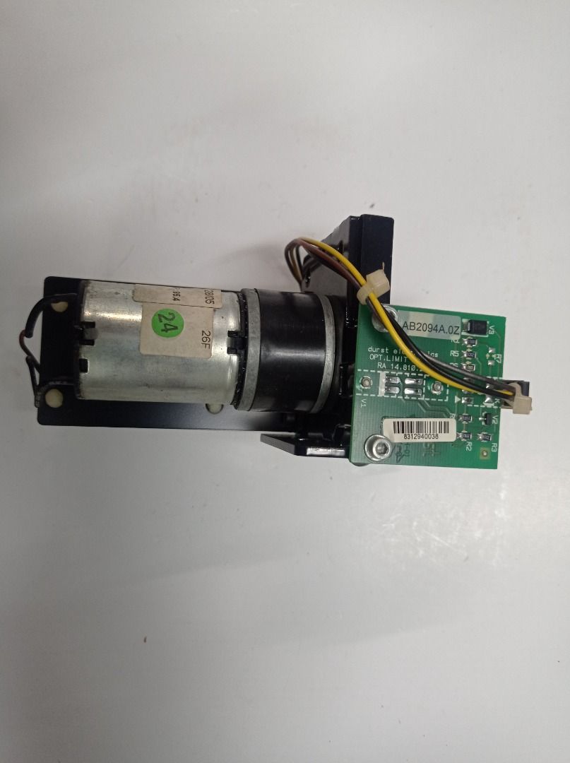 Durst Theta DC Geared Motors with Opto-Limit PCBs (Category: CDs & DVDs) located in Caloocan City. Submitted by agolito (Listing ID 1461236002, Image 1). Description: DURST THETA 24V DC GEARED MOTOR ASSEMBLIES WITH SENSOR PCBs Two original motor assemblies removed from a Durst Theta printing machine. Included: DC geared-motor assembly with Durst AB2094A optical-limit sensor PCB, mounting bracket, wiring and connectors. Larger geared-motor/clamp a
