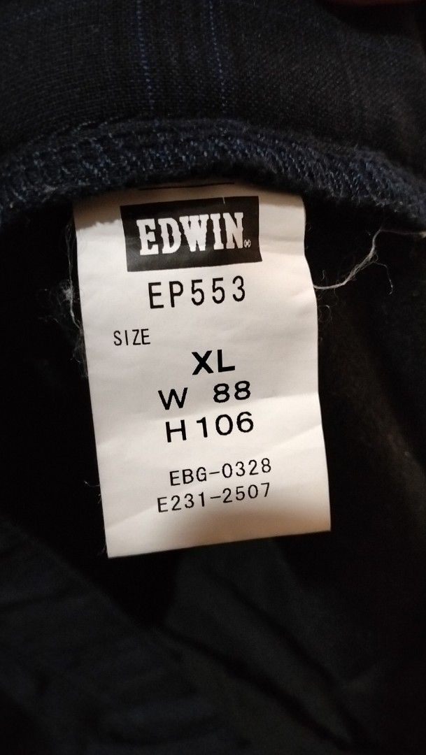 EDWIN Prestige Cargo Pants Size XL (Category: Jeans) located in Angeles City. Submitted by mightywhale_13072f (Listing ID 1461209249, Image 3). Description: - Dark navy Edwin Prestige cargo pants - Subtle plaid pattern - Size XL (Waist: 88cm, Hip: 106cm) - Multiple functional pockets - Secure button and zip closure - Perfect for casual outings and everyday wear.