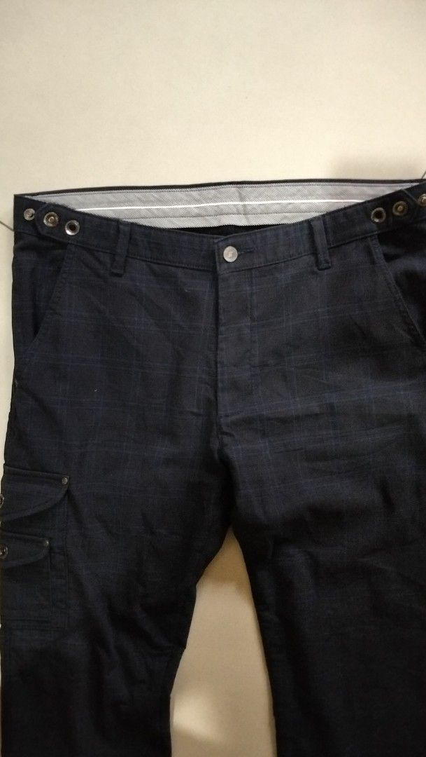 EDWIN Prestige Cargo Pants Size XL (Category: Jeans) located in Angeles City. Submitted by mightywhale_13072f (Listing ID 1461209249, Image 2). Description: - Dark navy Edwin Prestige cargo pants - Subtle plaid pattern - Size XL (Waist: 88cm, Hip: 106cm) - Multiple functional pockets - Secure button and zip closure - Perfect for casual outings and everyday wear.