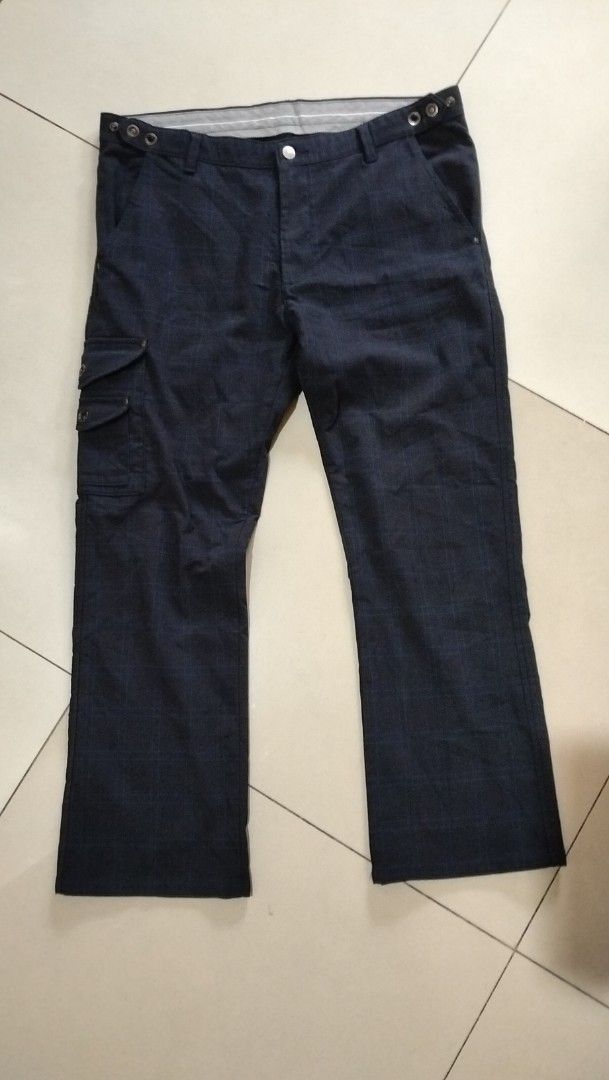 EDWIN Prestige Cargo Pants Size XL (Category: Jeans) located in Angeles City. Submitted by mightywhale_13072f (Listing ID 1461209249, Image 1). Description: - Dark navy Edwin Prestige cargo pants - Subtle plaid pattern - Size XL (Waist: 88cm, Hip: 106cm) - Multiple functional pockets - Secure button and zip closure - Perfect for casual outings and everyday wear.