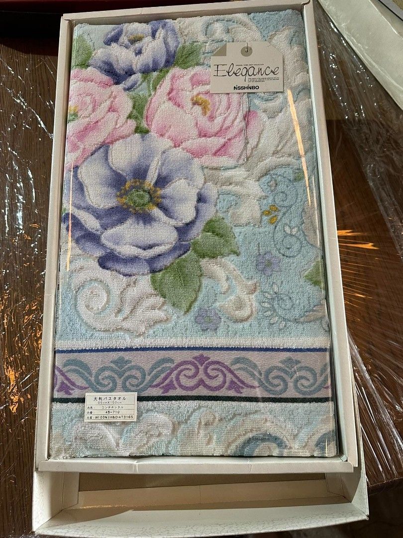 Elegance NSSHNBO Bath Towel Floral Pattern (Category: Bedding & Towels) located in Bulacan. Submitted by hunterherojapanjdm (Listing ID 1461276189, Image 1). Description: - Beautiful bath towel from Elegance - Features a lovely floral design with pink, purple, and blue flowers - Includes a decorative border - Made in Japan - Ideal for gifting or personal use.