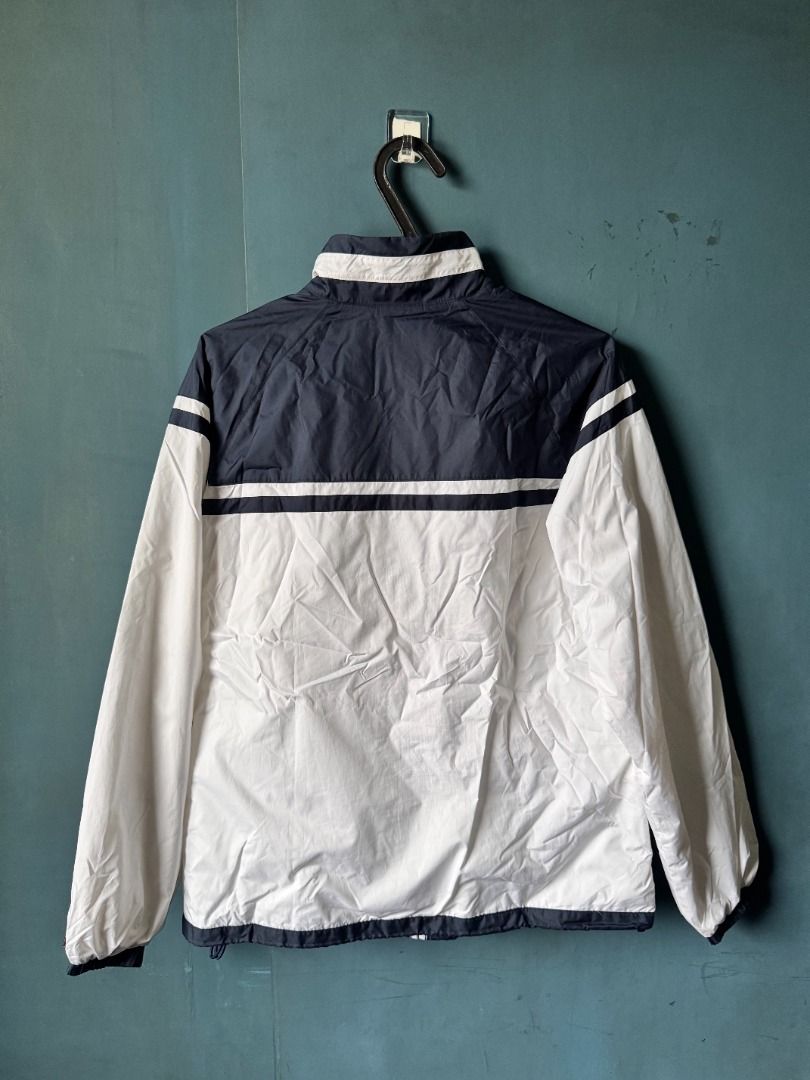 ellesse tennis jacket (white and navy) (Category: Coats, Jackets and Outerwear) located in Manila. Submitted by reesespiecess (Listing ID 1461275747, Image 2). Description: - white and navy ellesse tennis jacket - bought this at a japan outlet a few years ago - can't find the size on the tag but this best fits S-M - perfect jacket to wear on and off the court! - this was my lucky charm jacket when i used to play in tournaments so i hope it brings