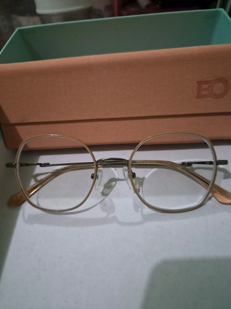 Executive Optical Eyeglasses Rose Gold Frame - (Model Fable) (Category: Sunglasses & Eyewear) located in Makati City. Submitted by alinalenn (Listing ID 1461141749, Image 1). Description: Hep me declutter New, never used. Though may grado na yung lens, you can just have it changed sa stores. Bought it as b1t1 sa EO then i realized i like my old frames more. - Rose Gold rim eyeglasses - Clear lenses - Comes with a peach colored case - Includes a s