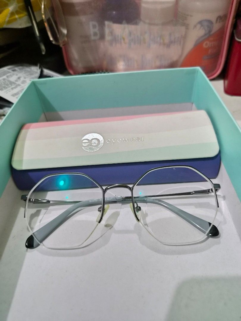Executive Optical Eyewear Glasses Frame (Model: Bobby s.d.gun) (Category: Sunglasses & Eyewear) located in Makati City. Submitted by alinalenn (Listing ID 1461142476, Image 2). Description: Hep me declutter New, never used. Though may grado na yung lens, you can just have it changed sa stores. Bought it as b1t1 sa EO then i realized i like my old frames more. - Silver and grey frames - Clear lenses - Includes hard case and cleaning cloth - Perfec