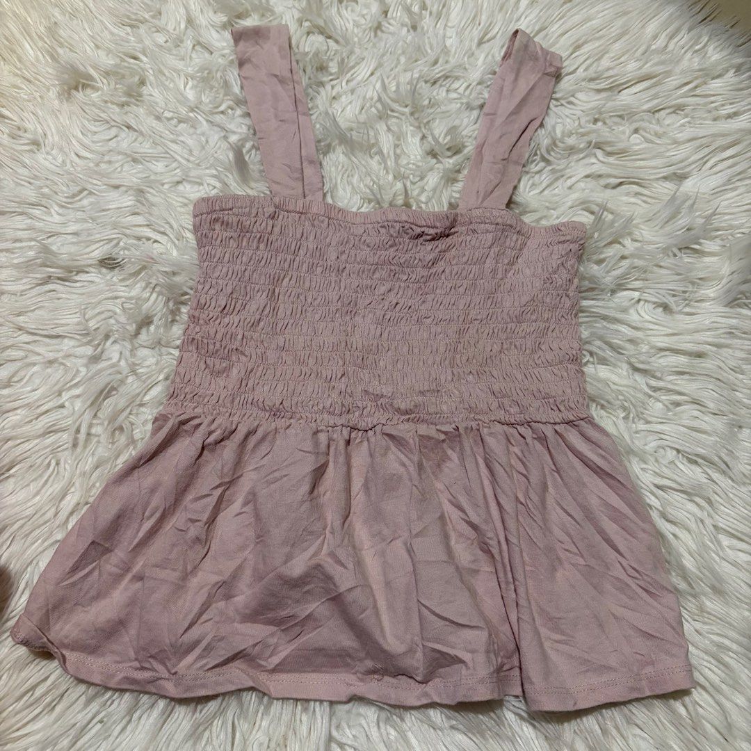 Express Smocked Peplum Top - Size S - Pink (Category: Sleeveless) located in Davao. Submitted by elizzadiac (Listing ID 1461226182, Image 1). Description: - Cute pink smocked top from Express - Features a square neckline with adjustable straps - Flattering peplum hem for added shape - Made in Indonesia - Size S - Perfect for casual or dressed-up occasions.