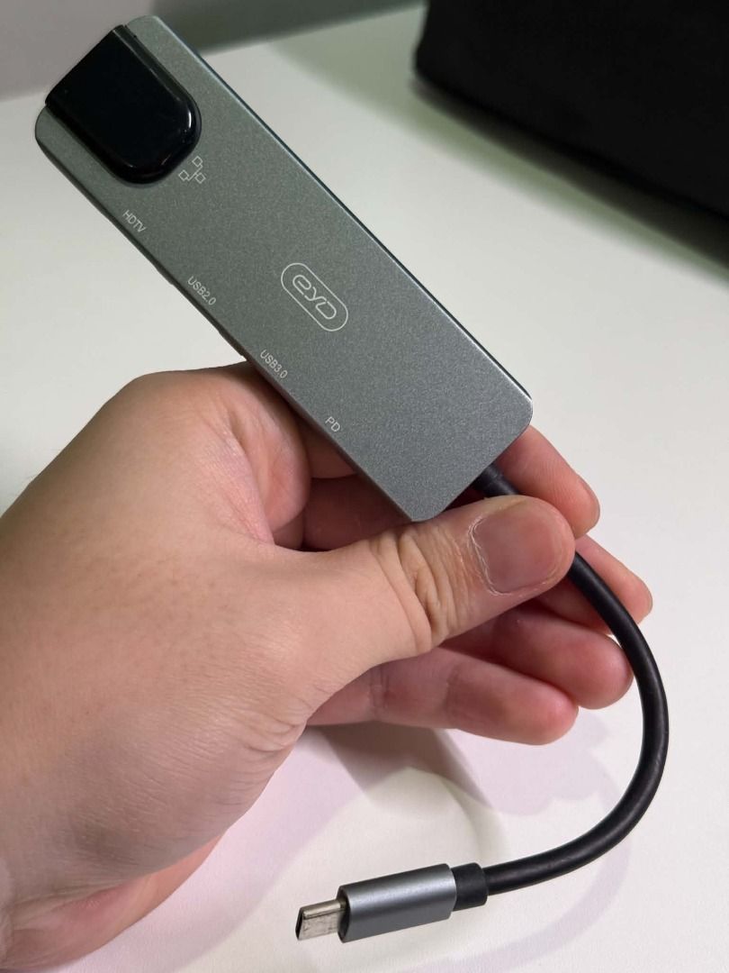 EYD USB-C Hub with HDMI, Ethernet, USB 3.0, PD (Category: Cables & Adaptors) located in Makati City. Submitted by rs_listings (Listing ID 1461255010, Image 3). Description: EYD USB-C Hub 📌 Condition: Used like new 💰 Price: ₱500 🚚 Shipping: Buyer books and pays for their own rider. After booking, please forward the rider's tracking link to us. Details: - Ports: HDMI, Ethernet, 2x USB 3.0 - USB-C Power Delivery (PD) charging - Connect all your p
