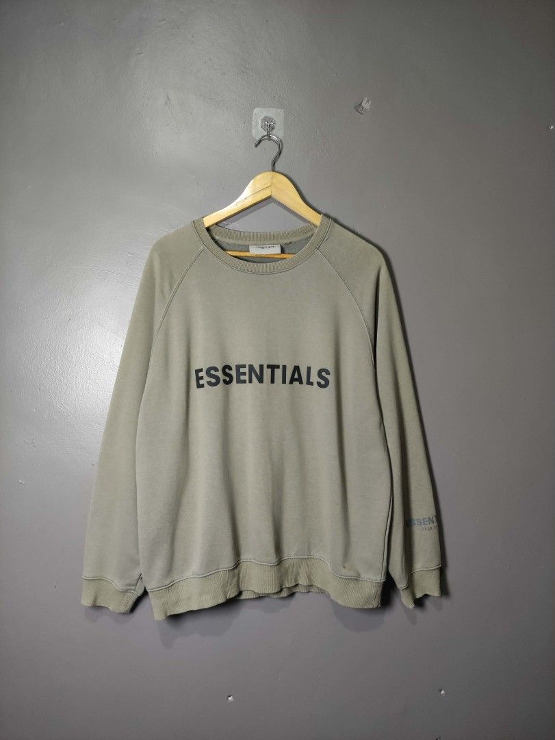 Fear of God Essentials Sweatshirt (Category: Activewear) located in Batangas. Submitted by andifits.ph (Listing ID 1461292831, Image 1). Description: Essentials sweatshirt - Size: Large "24 x 28" - Features brand name print on chest - Essentials logo on sleeve - Made in Vietnam - Material: 100% cotton - Care instructions: - Hand wash cold - Use non-chlorine bleach when needed - Flat dry - Do not iron.