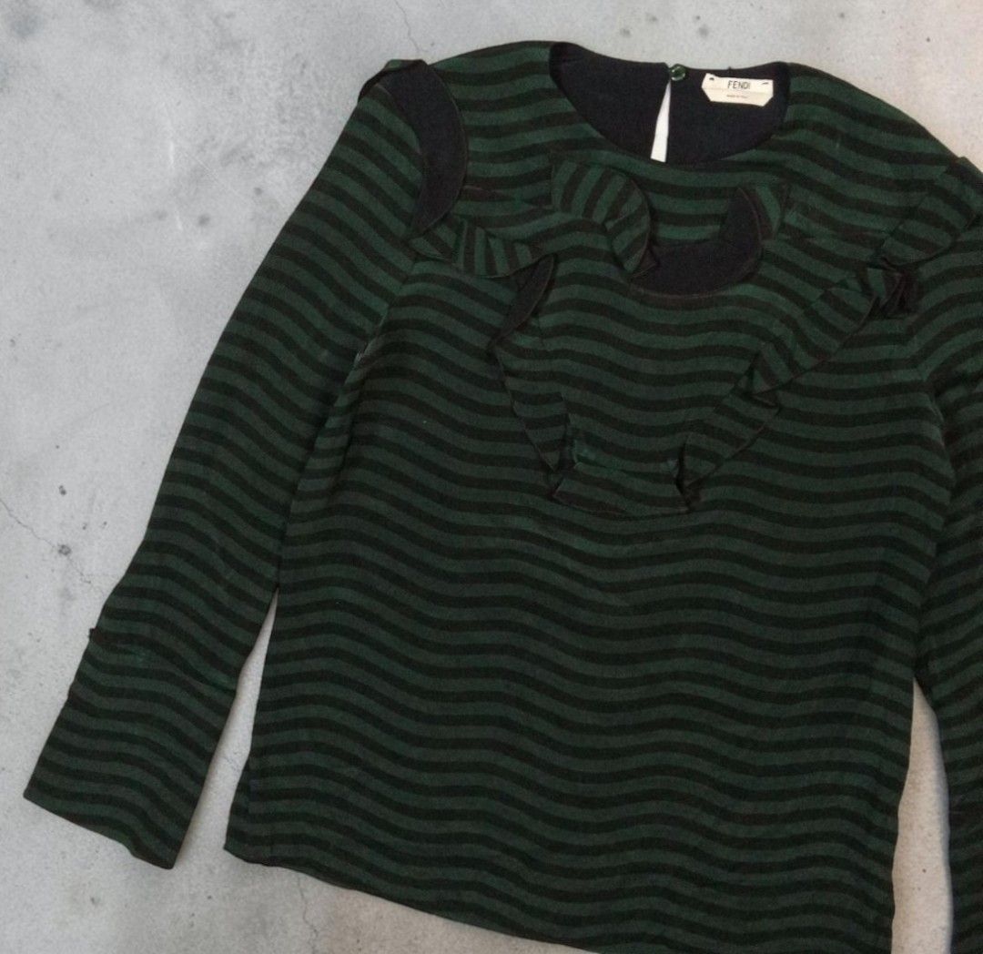 FENDI CRUMFOLD STRIPE LONGSLEEVE BLOUSE (Category: Blouses) located in Manila. Submitted by kinstugi.pieces (Listing ID 1461305938, Image 2). Description: Sizes: Medium Women's (36) Dimes: 18.5 inches, Width 16 inches, Shoulder 24 inches, Sleeve Length 25.5 inches, Length 20 inches, Hem Materials: Silk 100% Origin: Italy Authentic/Legit Color Rate: 9.5-10 Condition: 9.5-10 Presentable to Use Add Shipping fee.