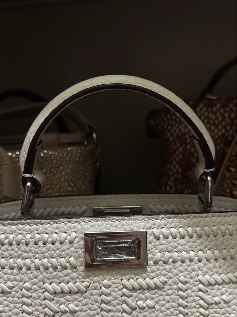 Fendi Peekaboo Mini Sling Bag (Category: Luxury Bags & Wallets) located in Quezon City. Submitted by kingwolf824 (Listing ID 1461252702, Image 3). Description: Flash sale today only! Fendi Mini Peekaboo. Genuine leather, comes with dustbag and sling. Can be a top handle bag or a sling bag. Perfect for any event. No returns, No exchange, No refunds..