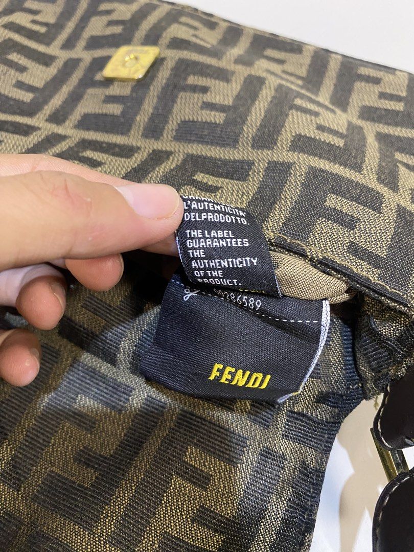 Fendi Zucca Baguette Bag (Category: Luxury Bags & Wallets) located in General Santos City (Dadiangas). Submitted by jokk.x (Listing ID 1461323809, Image 3). Description: - Authentic Fendi Zucca canvas baguette bag - Classic brown and black monogram print - Gold-tone FF hardware detail - Genuine leather strap and trim - Made in Italy - Authenticity guaranteed.