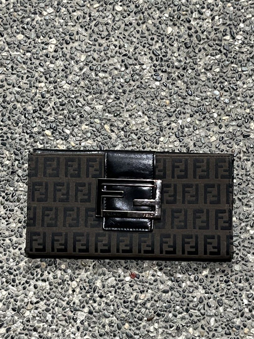 FENDI ZUCCA CONTINENTAL FLAP LONG WALLET (Category: Luxury Bags & Wallets) located in San Fernando. Submitted by archivalhighlights (Listing ID 1461293440, Image 1). Description: FENDI ZUCCA CONTINENTAL FLAP LONG WALLET CONDITION-10/10 MATERIAL- FF CANVAS HARDWEAR- SILVER-TONE METAL BUCKLE MADE IN- ITALY.