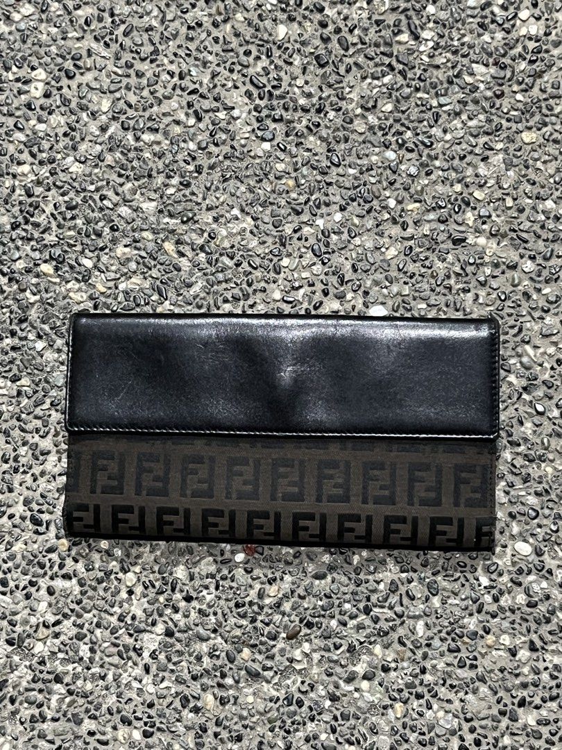FENDI ZUCCA CONTINENTAL FLAP LONG WALLET (Category: Luxury Bags & Wallets) located in San Fernando. Submitted by archivalhighlights (Listing ID 1461293440, Image 2). Description: FENDI ZUCCA CONTINENTAL FLAP LONG WALLET CONDITION-10/10 MATERIAL- FF CANVAS HARDWEAR- SILVER-TONE METAL BUCKLE MADE IN- ITALY.
