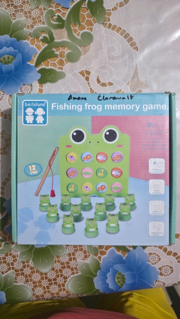 Fishing Frog Memory Game 36+ Months (Category: Educational & Learning Toys) located in Quezon City. Submitted by fabfindsph (Listing ID 1461223250, Image 2). Description: - Fun fishing frog memory game for kids 36 months and up. -Wood material - Comes with 12 pieces. - Helps develop memory and fine motor skills. - Great for little ones to play and learn. - Features a cute frog design with colorful circles and little frogs to catch..