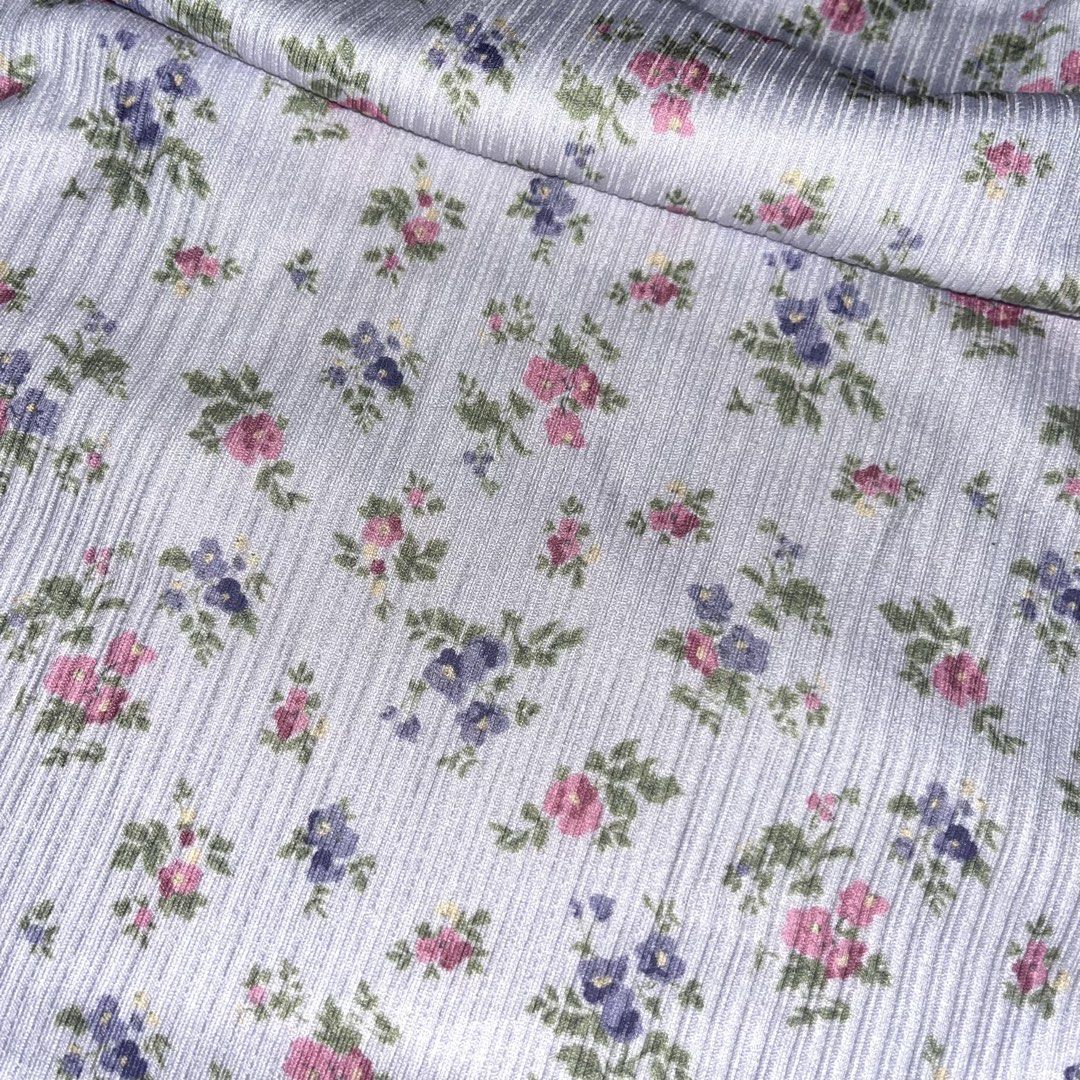 Floral Ruched Tube Top (Category: Sleeveless) located in Makati City. Submitted by midnightmelhem (Listing ID 1461130948, Image 2). Description: - Cute floral tube top from ROMWE - White base with pink and purple flowers - Features a ruched front detail - Green trim along the top edge - Made of ribbed material - Ideal for summer outfits.