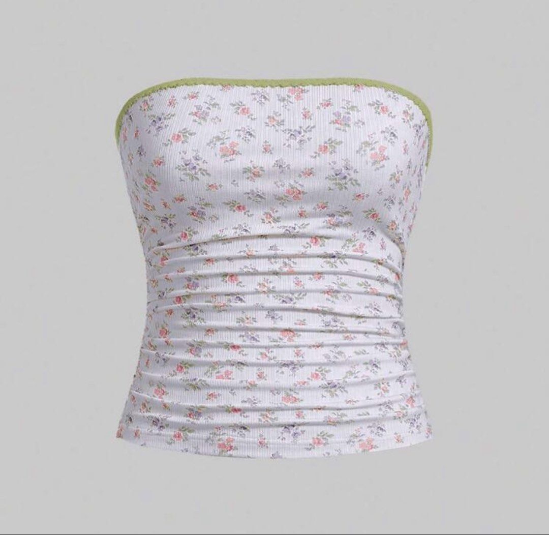 Floral Ruched Tube Top (Category: Sleeveless) located in Makati City. Submitted by midnightmelhem (Listing ID 1461130948, Image 1). Description: - Cute floral tube top from ROMWE - White base with pink and purple flowers - Features a ruched front detail - Green trim along the top edge - Made of ribbed material - Ideal for summer outfits.
