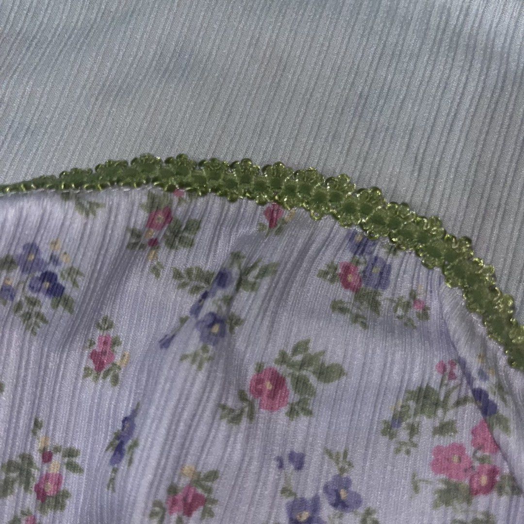Floral Ruched Tube Top (Category: Sleeveless) located in Makati City. Submitted by midnightmelhem (Listing ID 1461130948, Image 3). Description: - Cute floral tube top from ROMWE - White base with pink and purple flowers - Features a ruched front detail - Green trim along the top edge - Made of ribbed material - Ideal for summer outfits.