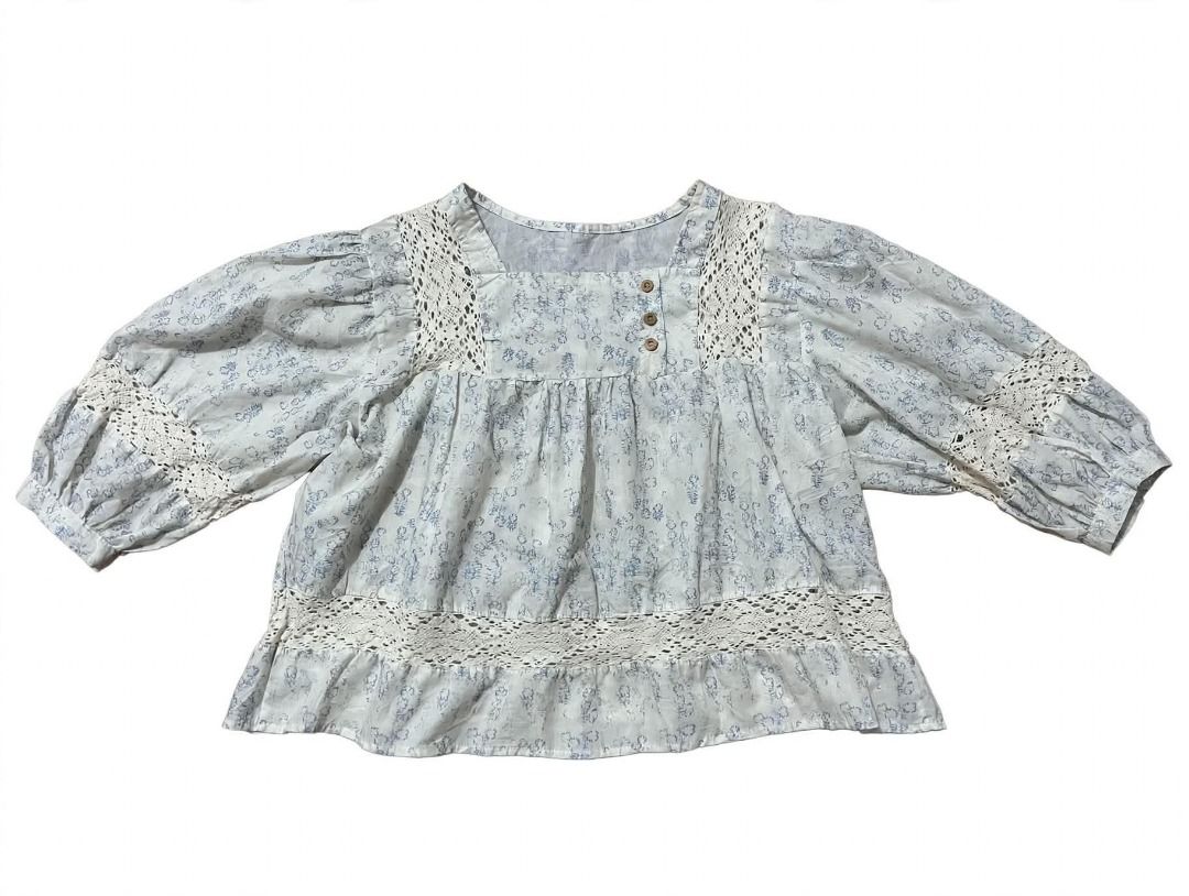 Floral Square Neck Blouse#76 (Category: Blouses) located in Caloocan City. Submitted by outfitloop (Listing ID 1461122902, Image 2). Description: - Cute white blouse - Square neckline - Three front buttons - Puff sleeves with lace trim - Lace detail along the hem IMPORTANT: • 1st photo is an AI styling/model preview for reference on how the item may look when worn. • Please refer to the actual photos for the item’s true appearance and condition. 
