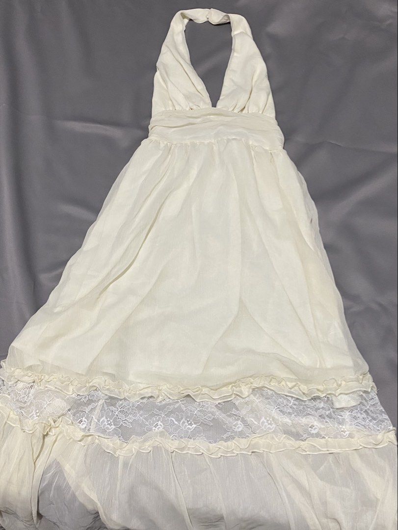 Flowy Cream Halter Lace Patchwork Dress (Category: Dresses) located in Bacoor. Submitted by sad.burrito (Listing ID 1461282943, Image 2). Description: -Used once for pics only - Halter design Courier via Lalamove or LBC, shipping fee shouldered by buyer. 📍 Bacoor, Cavite.