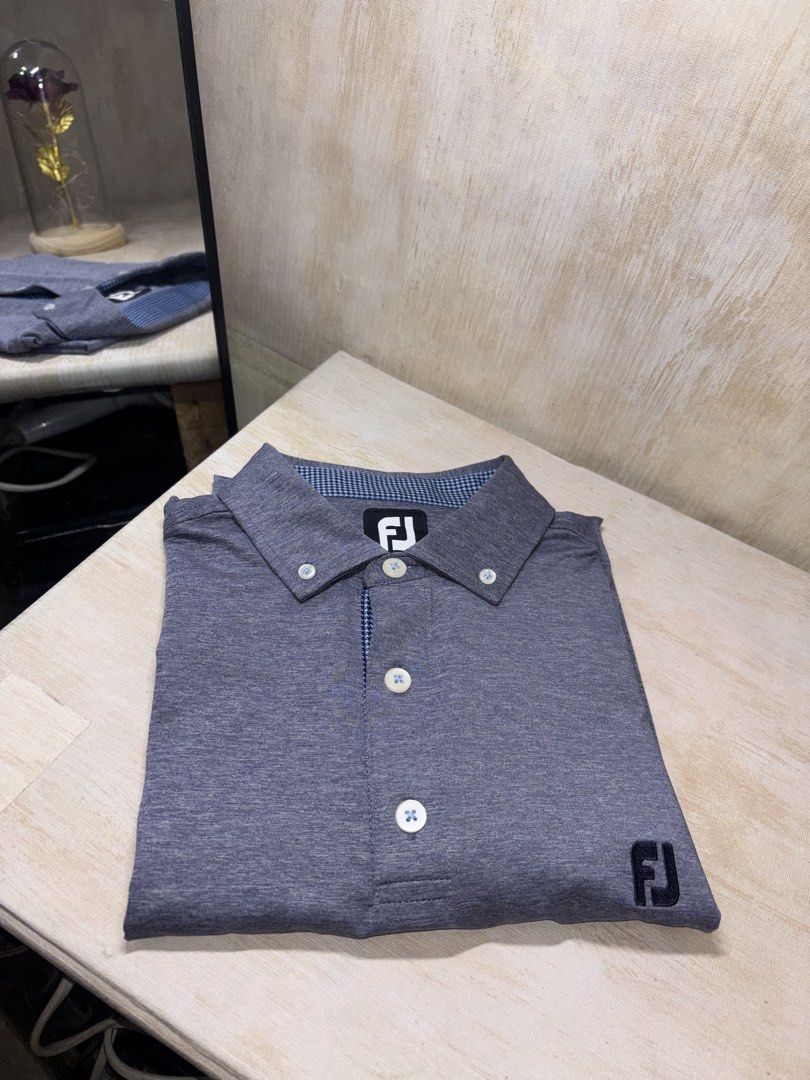FOOT JOY GOLF POLO SHIRT (Category: Tshirts & Polo Shirts ) located in Cabuyao City. Submitted by pormanation-thrift-store (Listing ID 1461140611, Image 2). Description: FOOT JOY GOLF POLO SHIRT Condition: LIKE NEW Color rate: 10/10 Size: XL (ASIAN) Dimes: 21.5”Wx28-29”L Issue: NONE❌ Price: 1200.