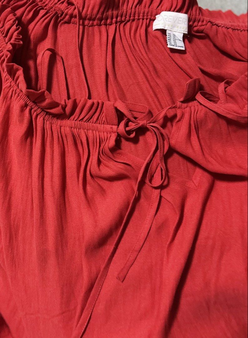 FOREVER21 (Category: Blouses) located in Davao. Submitted by sart0ria85 (Listing ID 1461260224, Image 3). Description: Red Bohemian blouse in an adjustable with or without shoulder sleeves. 100% POLYESTER MADE IN CHINA 🇨🇳 XXL. XXLARGE/SIZE 12-14 VERY GOOD CONDITION (89/100).