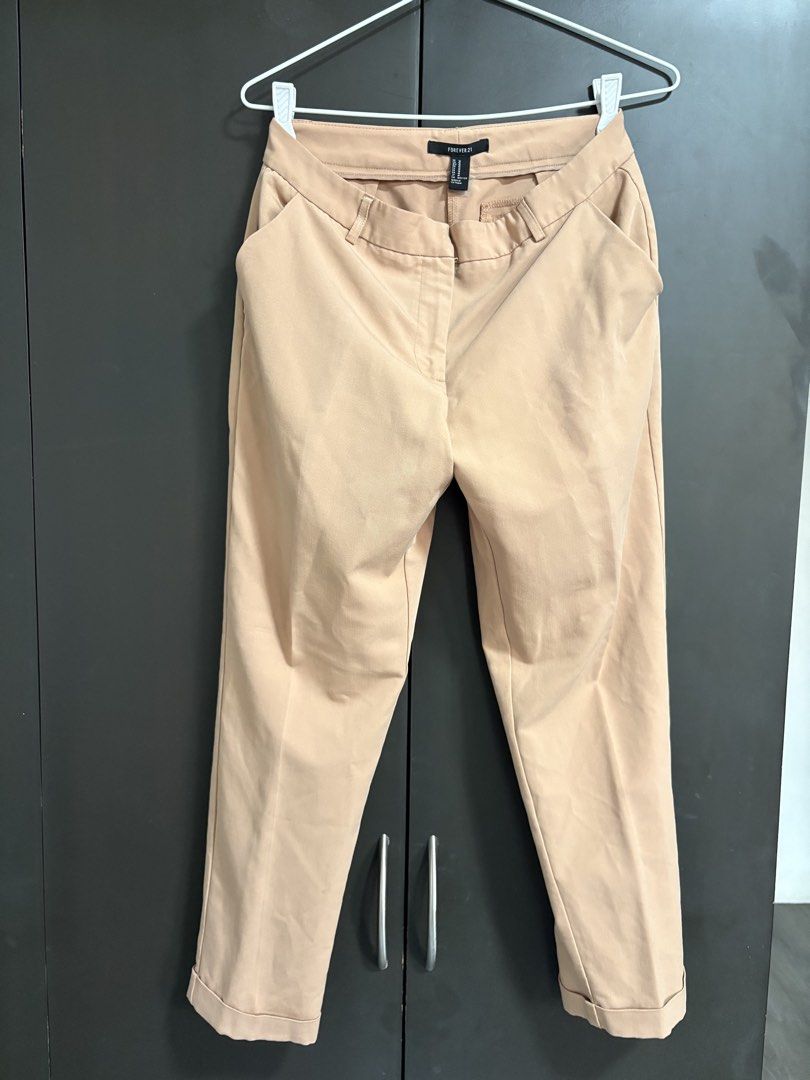 Forever 21 Beige Cropped Tailored Pants (Category: Other Bottoms) located in Las Pinas. Submitted by beissmart (Listing ID 1461190585, Image 1). Description: - Beige tailored pants from Forever 21 - Cropped length with cuffed hem - Classic pocket design - Versatile for work or casual outfits - Comfortable fit.