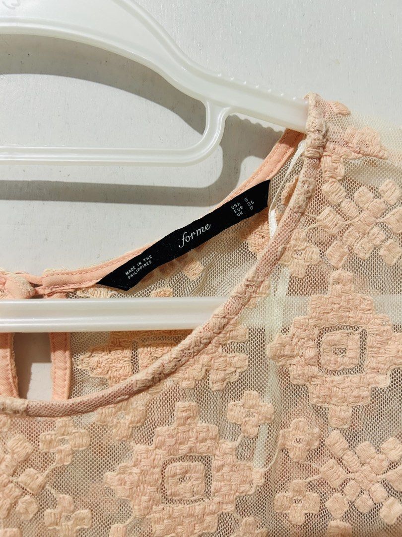 Forme Peach Lace Overlay Top with Camisole (Category: Sleeveless) located in Palo. Submitted by kaleidoscope_676 (Listing ID 1461125821, Image 2). Description: - Peach lace overlay top by Forme - Short sleeves - Round neckline with back keyhole detail - Comes with a matching peach camisole - Proudly made in the Philippines - Versatile for dressing up or down.