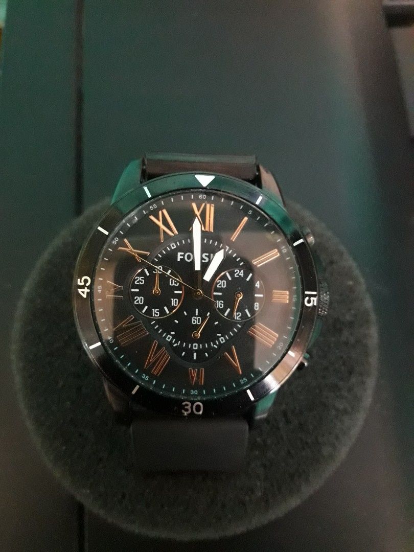 Fossil Chronograph Watch Black Dial Roman Numerals (Category: Men's Watches) located in Paranaque City. Submitted by omaraguirre (Listing ID 1461172154, Image 1). Description: - Fossil watch with a sleek black dial - Features elegant Roman numeral hour markers - Functional chronograph with sub-dials for added utility - Comfortable black strap - Durable stainless steel case back - Versatile design suitable for both casual and formal wear.